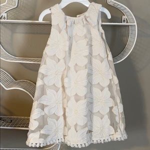 White toddler dress with embroidered flowers